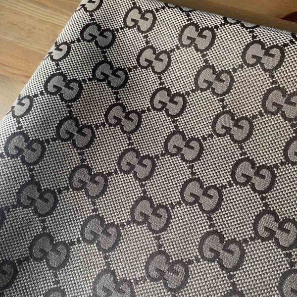 brown gucci canvas fabric with big patterns