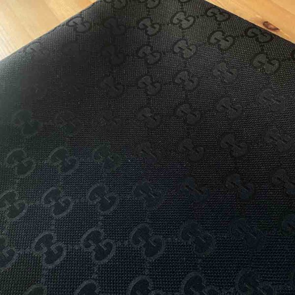 black gucci canvas fabric with big patterns