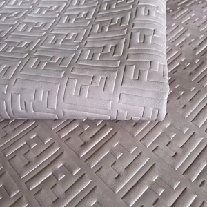 white fendi leather fabric with embossed ff pattern