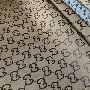 gucci jacquard fabric with bigger patterns which is goot for laying and upholstery