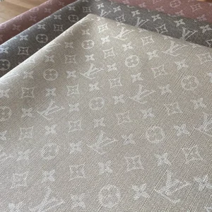This champagne lv fabric seems like a denim. The print of fabric gives that effect. however it is a thick vinyl fabric which has a black reverse side. it is durable and rigid material which is ready to make a bag or too many crafting alternatives.