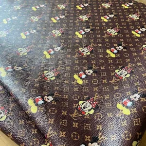 louis vuitton brown leather with minnie and mickey mouse pattern