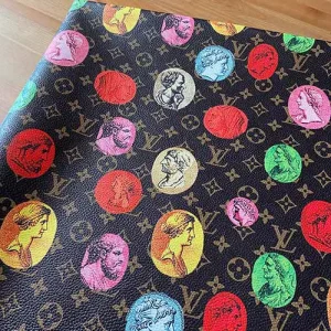 lv faux leather which has fornasetti bags print on it