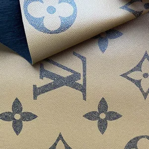 louis vuitton tan colored vinyl leather fabric with big black letters