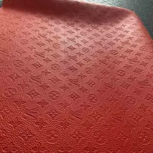LV embossed empreinte red leather fabric